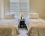 Middle bedroom with twin beds